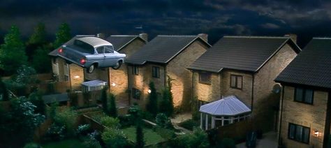 Harry Potter and the Chamber of Secrets - A flying Ford Anglia approaches Number 4 Privet Drive. Flying Ford Anglia, 4 Privet Drive, The Chamber Of Secrets, Ford Anglia, Harry Potter And The Chamber Of Secrets, Save File, Chamber Of Secrets, Number 4, Nursery Prints