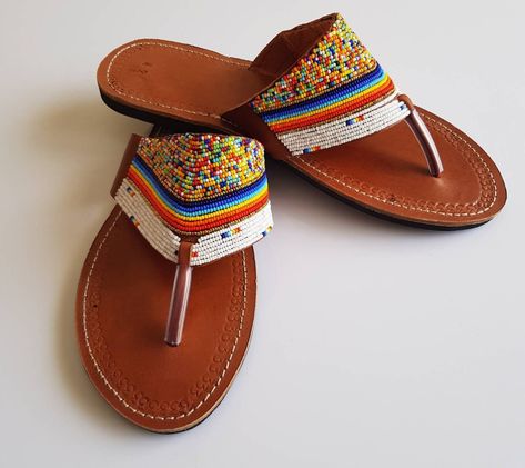 Get your latest collection of Leather beaded sandals for women. They are in a variety of colors and style. Handmade with love. Add these to your collection today! For more details contact 0750 605401 or Visit CBD maximum business center 2nd floor https://bellorecrafts.com/shop/shoes/ #leathersandals❤️❤️❤️ #leathersandalsforwomen #leathersandalsforkids #leathersandalsformen #leathersandals African Sandals, Christmas Gift Earrings, Fancy Sandals, Horn Earrings, African Earrings, Mens Leather Sandals, Handmade Sandals, Beautiful Sandals, Beaded Sandals