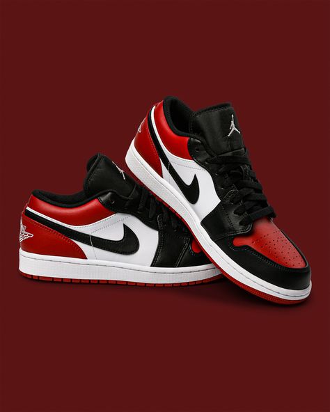 The rest of the upper one is Peter Moore’s more lifestyle-oriented version of Michael Jordan’s first signature sneaker divvies of a “yin-and-yang”-appropriate scheme, with the forefoot area being reinforced with “Black” leather; quarter panels, lace guards, and profile swooshes follow suit. Air Jordan 1 Low With Suit, Nike Jordan Red, Jordan 1 Low Red Outfit, Nike Red, Air Jordan 1 Low Red, Jordan 1 Low Red, Nike Jordan Air 1, Jordan 1 Black Satin Gym Red, Black And Red Air Jordans