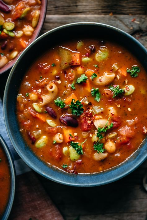 Minestrone is one of our favorite classic soup recipes – this version is vegan and packed with healthy, delicious vegetables, beans and pasta. So comforting! #minestrone #vegansoup #veganrecipes #souprecipe #vegetableminestrone #soup #vegancomfortfood #vegetarian #foodphotography #soupphotography | crowdedkitchen.com Minestrone Soup Photography, Soup Photography, Vegan Minestrone, Vegan Minestrone Soup, Healthy Food Photography, Vegan Italian Recipes, Mediterranean Cookbook, Cod Recipe, Minestrone Soup Recipe