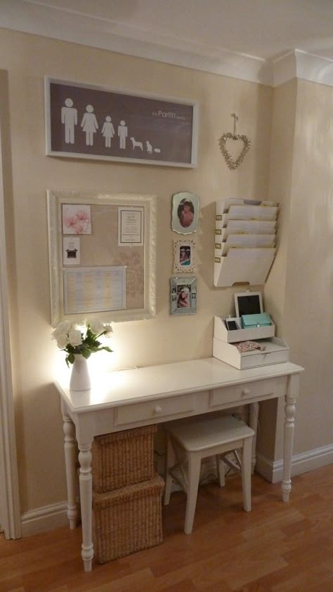 Tuck a narrow desk, mini stool, and hanging storage into a wide hallway to create a designated spot for paying bills and balancing your budget. That might not sound fun, but a pretty desk and an organized memo board can actually adds style to a bare spot.  See more at Home Heart Harmony »   - HouseBeautiful.com Home Command Center, Desk Areas, Versace Home, Command Center, Craft Room Office, Design Case, My New Room, Apartment Living, 인테리어 디자인