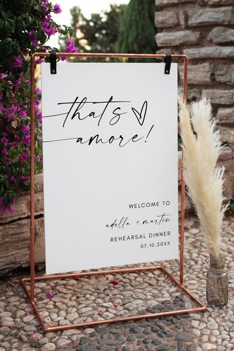 "🍾 Welcome to OhLillyDesign's Modern Italian \"That's Amore\" Bridal Shower Welcome Sign! 🌿 TRY BEFORE BUY: https://templett.com/design/demo/ohlillydesigns/23401702,23401699,23401697,23401693 Elevate your event with a touch of modern Italian romance using our exquisite Modern Italian \"That's Amore\" Bridal Shower Welcome Sign. Created by OhLillyDesign, this sophisticated sign is not just visually stunning but also entirely editable on Templett, enabling easy customization right from your phone. 🇮🇹 Modern Italian Elegance: Embrace the chic charm of modern Italian design. Perfect for Italian engagements, wedding showers, bridal showers, or any event, this welcome sign exudes an air of sophistication and love, making your celebration truly memorable. 📏 Size Options: Choose from a select Italian Rehearsal Dinner, Rehearsal Dinner Themes, Italian Bridal Showers, Rehearsal Dinner Welcome Sign, Rustic Italian Wedding, Italian Inspired Wedding, Italian Theme, Bridal Shower Sign, Themed Bridal Shower