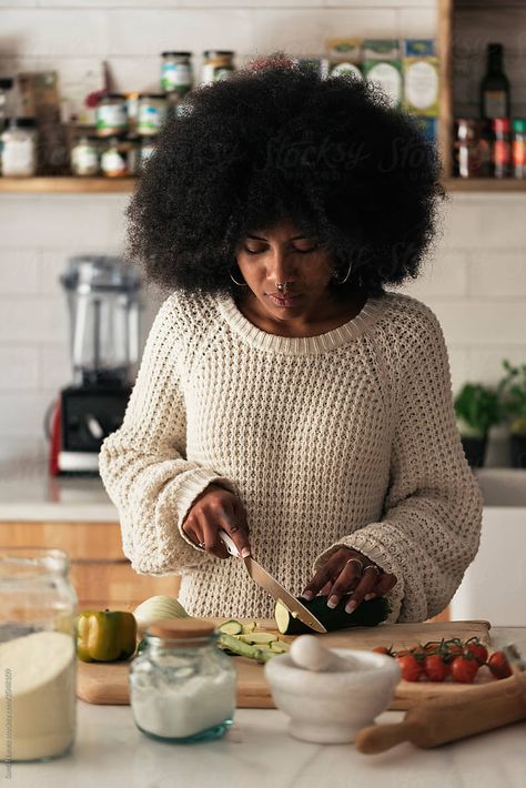 Beautiful black woman cooking in her home. Cooking concept. Cooking Reference Photo, Cooking Aesthetic Girl Black, Cooking Photoshoot Aesthetic, Home Cook Photography, Cooking In The Kitchen Photography, Branding Photos In Kitchen, Home Cook Aesthetic, Black Woman Journaling Aesthetic, Black Cooking Aesthetic