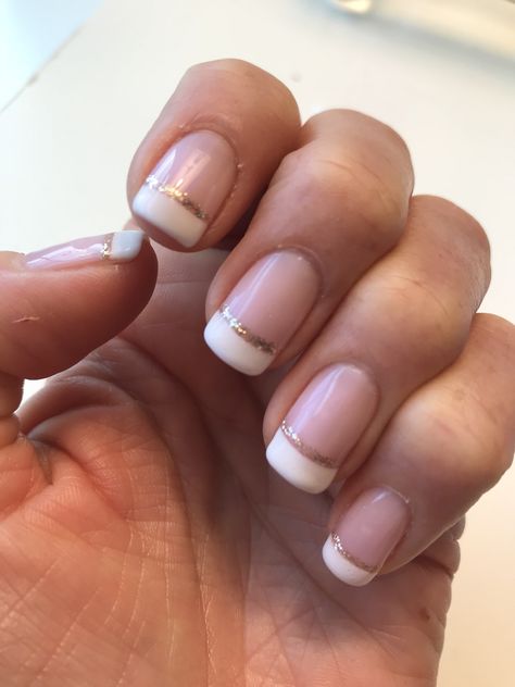 French manicure with rose gold sparkles French Tip Nails With Sparkle Line, French Manicure With Rose Gold, Rose Gold French Manicure Nails, Beach French Manicure, Rose Gold Tips Nails, Rose Gold French Manicure, French Manicure With Gold Line, French Manicure With Gold, Gold French Manicure