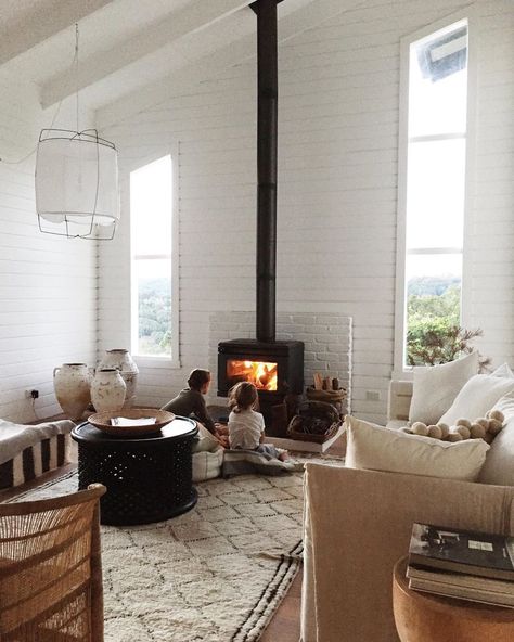 Natalie Walton on Instagram: “First fire of the season. Blankets are being turned into forts and cubbies while the sun sets across the sky. Last Friday we headed…” Tripolina Chair, Natalie Walton, Wood Burners, John Payne, Foldable Chair, Modern Tiny House, Coastal Living Room, Last Friday, Wood Burner