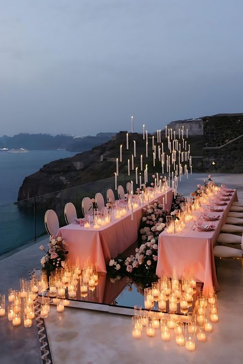 Set the stage for an unforgettable evening with a magical soiree. Soft candlelight and a breathtaking view make for a perfect romantic beach wedding by the cliff! Beach Dinner Decor, Candle Set Up, Beach Engagement Party Ideas, Beach Wedding After Party, Candle Only Centerpieces Wedding, Beach Cliff Wedding, Beach View Wedding, Wedding Decorations Romantic, Lake Wedding Reception