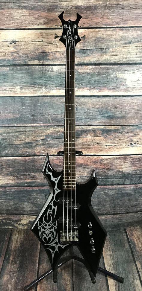 Goth Bass Guitar, Cool Electric Basses, Bc Rich Guitars Warlock, Warlock Bass Guitar, Bass Guitar Pictures, Cool Instrument Design, Bass Electric Guitar, Warlock Electric Guitar, Bc Rich Warlock Guitar