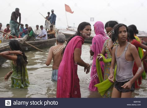 Download this stock image: Bathing in holy Ganges river, Varanasi, India. - B26YAE from Alamy's library of millions of high resolution stock photos, illustrations and vectors./ Ganga River Bath, River Bath, Ganges River, Indian River, Teen Girl Dresses, Bath Girls, Hot Women Dress, Beautiful Dresses For Women, Varanasi