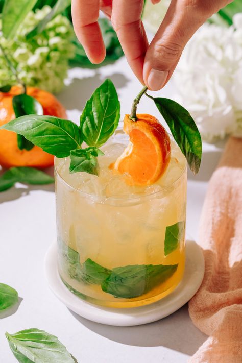 Citrus Basil Smash Mocktail | The Social Sipper Pretty Mocktail Recipe, Spring Mocktail, Basil Smash Cocktails, Citrus Mocktail, Watermelon Basil Mocktail, Basil Mocktail, Lime Mojito Mocktail, Summer Coffee Drinks, Beautiful Drinks