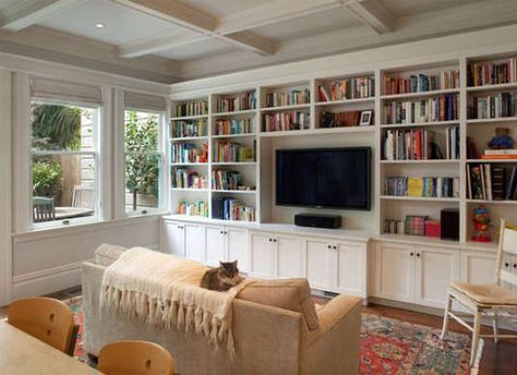 This is a great way to integrate a flat screen TV into a living room. Anchoring it in a custom built in makes it look natural and part of the room Bookshelves With Tv, Traditional Family Room, Living Room Built Ins, Bookcase Design, Home Library Design, Living Room Red, Living Room Shelves, Trendy Living Rooms, Built In Bookcase