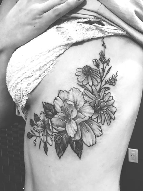 Gladiolus Flower tattoo black and white rib tattoo Flower Tattoo Black And White, Gladiolus Flower Tattoo, Flower Tattoo Black, White Gladiolus, Gladiolus Flower Tattoos, Ribs Tattoo, Sunflower Tattoo Thigh, Sunflower Tattoo Simple, Gladiolus Tattoo