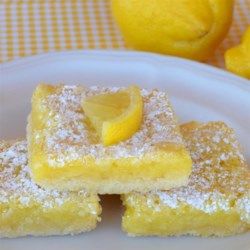 The Best Lemon Bars - Allrecipes.com Homemade Cookie Bars, The Best Lemon Bars, Lemon Cream Cheese Bars, Best Lemon Bars, Cranberry Dessert, Cream Cheese Bars, Lemon Bars Recipe, Cheese Bar, Poke Cakes