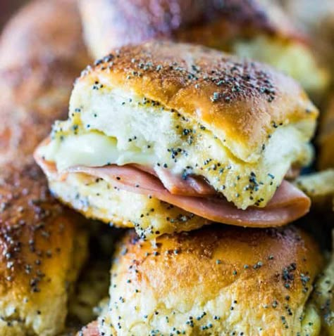 The Best Baked Sweet Ham and Swiss Sliders-- sweet, cheesy, goodness.