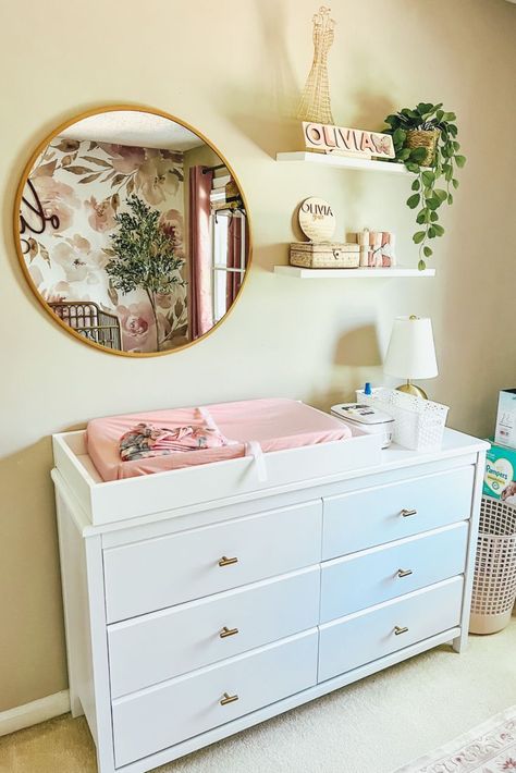 Decor inspo for a cute baby girl nursery: floral, blush and gold Mobile Home Nursery Ideas, Nursery Changing Table Wall Decor, Above Nursery Dresser Decor, Above Changing Table Decor, Nursery Dresser Ideas, Baby Girl Nursery Theme, Nursery Wall Decor Ideas, Nursery Dressers, Nursery Ideas For Girls