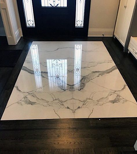 Hardwood With Marble Slab Entryway Tile Design Ideas Carrera Marble Entryway, Large Marble Floor Tiles, Marble Tile Entryway, Marble Flooring Design Entrance, Wood And Marble Floor, Marble Entryway Floor, Entry Tile Ideas, Entrance Tiles Entryway, Entryway Flooring Ideas Tile