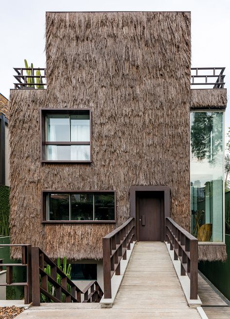 Campanas Brothers use palm fibre to give Sao Paulo house hairy texture Thatched Roof, Natural Building, Top Interior Designers, Facade Architecture, Facade Design, Built Environment, Facades, Residential Architecture, Contemporary Architecture