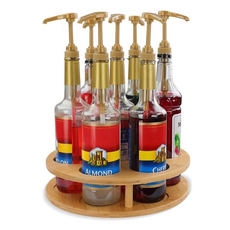 PRICES MAY VARY. [Add Some Function]: The 7Penn Barista Flavored Syrup Bamboo Turntable Coffee Bar Countertop Organizer adds efficiency to your morning iced coffee routine [7 Flavor Capacity]: This rotating syrup rack has 3.4in (8.5cm) diameter slots to accommodate up to 7 flavors; Compatible with Torani, Monin, and DaVinci 750ml syrup bottles [Save Counter Space]: Unlike tiered coffee syrup holders, this wooden lazy susan syrup rack for coffee bar tucks under cabinets to free up valuable counte Syrup Organizer, Turntable Organizer, Iced Lattes, Torani Syrup, Coffee Trailer, Syrup Bottle, Coffee Business, Coffee Stands, Coffee Syrup