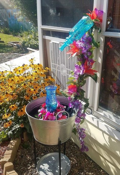 the sights and sounds of paradise my tropical tiki fountain Yard Fountain Ideas, Front Yard Fountain Ideas, Wine Bottle Fountain, Front Yard Fountain, Wine Fountain, Fairy Herb Garden, Bottle Fountain, Yard Fountain, Diy Solar Fountain