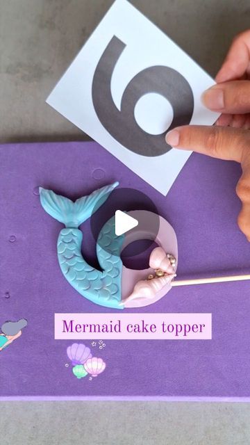 Love4sweetsandcake on Instagram: "✨️How to make a mermaid cake topper number 6 ✨️  This video shows step by step how to make a mermaid themed cake topper 🧜‍♀️  I made this video because i got often questions about where to put a cocktaiI stick in the number (without tearing or cracking the fondant up) and also if i could make a mermaid topper 🐚🪸.   So today i made this tutorial specially for the ones who asked me to show a mermaid themed number and how to put a cocktaiI stick in the topper. Hope you like it 🩷.  🎂 Tip: Make rotational movement (don't push) when putting the stick into the topper. Make sure the stick stays straight, don't go down or up or the stick will come out of the fondant. In the video you can see how i put a toothpick into the mermaid tail, this is also how you put Mermaid Topper, Mermaid Themed Cake, Fondant Numbers, Cake Topper Number, Mermaid Cake Topper, Number Cake Toppers, Cake Topper Tutorial, Fondant Tutorial, Mermaid Lover