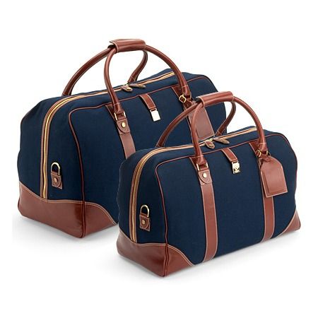 A statement of understated elegance, inherent quality and luxury travel, The Aspinal Travel Bag Set in Navy Canvas with Cognac leather trim includes two convenient sizes, the medium sized Weekender and the large Grand Tourer. The Weekender is... Luxury Travel Bags, Travelling Bag, Best Travel Bags, Traveling Bag, Cute Luggage, Travel Bag Set, Stylish Luggage, Canvas Travel Bag, Leather Weekender