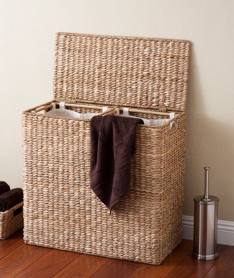 A lovely woven fiber laundry basket with divided sides for dark and light clothing — toss your dirty clothes into the correct basket at the end of each day and finish the worst busywork of laundry day before that day even comes. 31 Products To Help Make Laundry Day Far More Efficient And Much Less Miserable Double Laundry Hamper, Clothes Dividers, Laundry Hamper With Lid, Laundry Sorter, Clothes Hamper, Woven Baskets Storage, Clothes Basket, Laundry Storage, Laundry Hamper