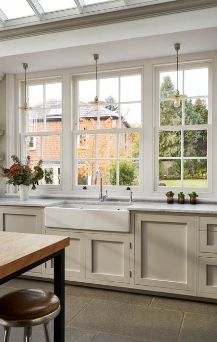 Beautiful sliding sash windows with large kitchen butler sink Sink Looking Out Window, Large Window In Kitchen Over Sink, Windows To Countertop Kitchen, Kitchen Sink With Large Window, Kitchen Sink Looking Out Window, Large Window Over Sink, Kitchen Pendant Lights Over Sink, Kitchen With Window Over Sink, Kitchen Garden Window Over Sink