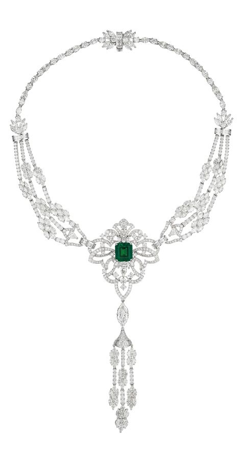 An Impressive Diamond and Emerald Necklace:  Set to the front with an open-work vari-cut diamond plaque, centering upon a square cut Colombian emerald weighing approximately 6.01 carats, suspending a marquise-cut diamond weighing approximately 2.37 carats and vari-cut diamond fringes, to the similarly designed backchain, mounted in platinum, length 15 1/4 inches, drop length 3 1/4 inches.  Via Philips. Emerald Necklace Set, Titanic Jewelry, Solitaire Pendant Necklace, Necklace Green, Royal Jewels, Emerald Necklace, Deco Jewelry, Emerald Jewelry, Square Cut