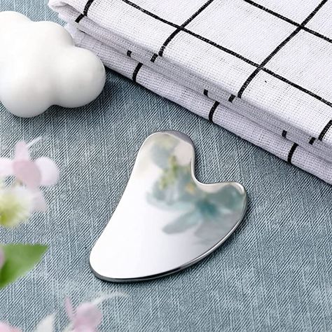 Cheap and easy tool use for lymphatic drainage. Steel Gua Sha, Sculpted Face, Facial Tools, Facial Massage Tool, Gua Sha Massage, Gua Sha Facial, Tighten Skin, Gua Sha Tools, Neck Massager