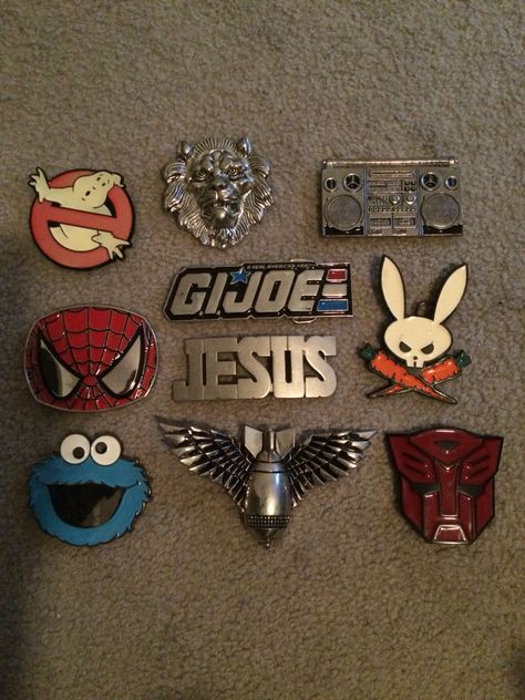 My old collection of belt buckles. Spidie-cookie monster-transformer-ghostbuster-mad rabbit-gi joe-jesus-boomboxin-lion-rocket 2000s Accessories, Cool Belt Buckles, Y2k Accessories, Fits Clothes, Funky Jewelry, Jewelry Lookbook, Cool Fits, Cookie Monster, Cute Pins