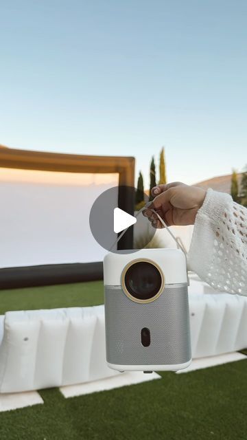 Nelly Irias | Arizona Interior Designer on Instagram: "Summer is finally here and we are loving our outdoor movie set up! 🌙☀️ Comment SHOP below to receive a DM with the link to shop this post on my LTK ⬇ https://liketk.it/4HOgF . . Outdoor movie must haves - backyard movie projector - inflatable bed - Fabric Sunbed Lounger - Inflatable projector screen - white cooler - neutral bean bag - popcorn maker - outdoor umbrella - outdoor furniture #LTKoutdoor #LTKsummer  #ltkfamily #ltkseasonal #ltkhome #summermusthaves #summerbackyard #backyard" Outdoor Projection Screen Ideas, Outdoor Movie Projector Set Up, Backyard Projector Screen, Movie Projector Outdoor, Arizona Interiors, Outdoor Projector Screen, Inflatable Movie Screen, Projector Stand, Outdoor Movie Screen