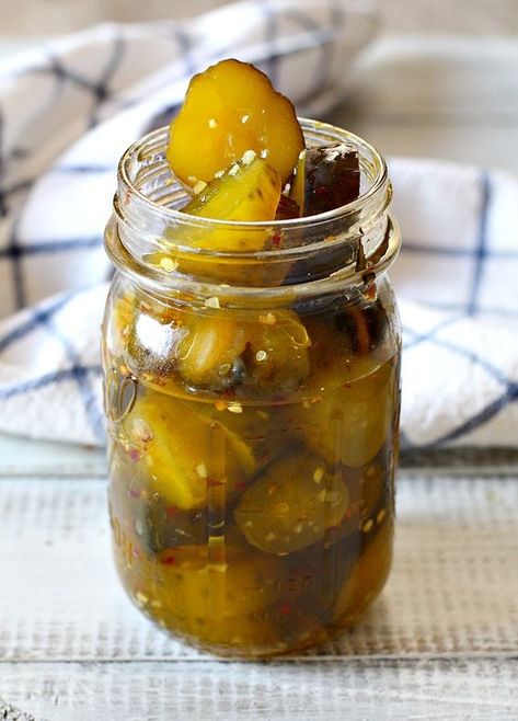 Best Homemade Sweet Spicy Pickles Recipe. So easy because they're made from jarred dill pickles. These are perfect for snacking, a great pickle for sandwiches, a great pickle a relish plate, and of course a delicious pickle for your favorite burger. I've taken these to pot lucks and picnics. They also make a delicious hot dog topping. They're perfect! #homemade #spicy #pickles #sweet #easy Sweet Hot Pickles, Spicy Pickle Recipes, Sweet Pickles Recipe, Hot Pickles, Hot Dog Toppings, Pickles Recipe, Spicy Pickles, Pickle Recipe, Refrigerator Pickles