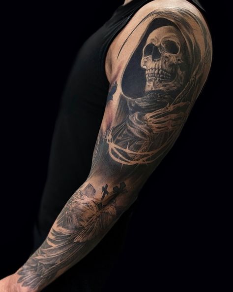 Grim reaper sleeve for Ramiro’s FIRST TATTOO 🤯 Outer arm is fully healed, inner arm was very angry after our last session so we won’t capture dat yet lol I love grim reaper concepts and wouldn’t mind more of demmmmm 👁️👄👁️ Thank you Ramiro for letting me be a part of a super fun project Books will reopen in October for February dates and onwards Thanks for looking! • • • • • • #grimreapertattoo #raventattoo #denvertattoo #blackandgrayrealism #coloradotattoo Grim Reaper Upper Arm Tattoo, The Grim Reaper Tattoo, Grim Reaper Sleeve, Colorado Tattoo, Grim Reaper Tattoo, Reaper Tattoo, Full Arm Tattoos, Upper Arm Tattoos, Raven Tattoo