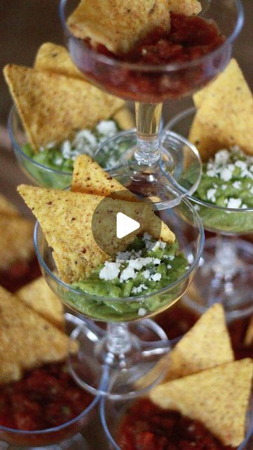 Megan Ruffles on Instagram: "Please read this caption👇🏻  Comment link to shop these stackable champagne glasses.   There are so many things you could do with these. Let me know if you want more ideas. Would be fun for a graduation party, bridal shower, baby shower, etc.   Please note: the chips get soggy fairly quickly in the salsa so add your chips right before serving or just do chips and guacamole. The chips don’t get soggy in guac like they do in salsa. You could also fill each glass with salsa only and have  a big bowl of chips on the side for guests to add as they wish.   #bridalshowerfood #graduationpartyideas #graduationpartyfood #babyshowerfood #cincodemayoparty" Appetizers In Champagne Glasses, Individual Chips And Salsa, Shotcuterie Ideas, Shotcuterie Party, Chips And Guacamole, Guacamole Chips, Friendsgiving Dinner Party, Graduation Party Foods, Nacho Chips