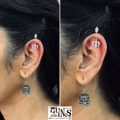 Piercings at @gunsandinkstattoos . . . #mensearpiercing #septumpiercing #eyebrowpiercing #childpiercing #navelpiercing #nosepiercing #industrialpiercing #lobepiercing #helixpiercing #conchpiercing #piercings #piercingsinhyderabad #gunsandinkstattoos #besttattoostudioinhyderabad #tattoostudioingachibowli #hyderabad #gachibowli #hyderabadi #hyderabadlocals #femaletattooartist #tattootraining #tattootrainingcourse #tattootraininginstitute. Bugudi Ear, Ear Bugadi, Dark Green Velvet Dress, Female Tattoo Artists, Industrial Piercing, Shiva Wallpaper, Eyebrow Piercing, Green Velvet Dress, Lobe Piercing