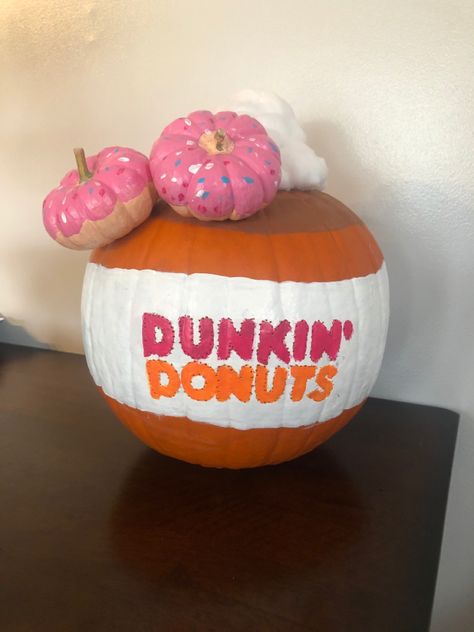 Painted Dunkin Donuts latte pumpkin. Dunkin Donuts Painted Pumpkins, Doughnut Pumpkin Painting, Dunkin’ Donuts Pumpkin, Dunkin Donuts Pumpkin Decorating, Coffee Pumpkin Decorating, Painting Pumpkins Creative, Funny Painted Pumpkins Ideas, Painted Pumpkin Ideas Creative Funny, Pumpkin Painting Donut