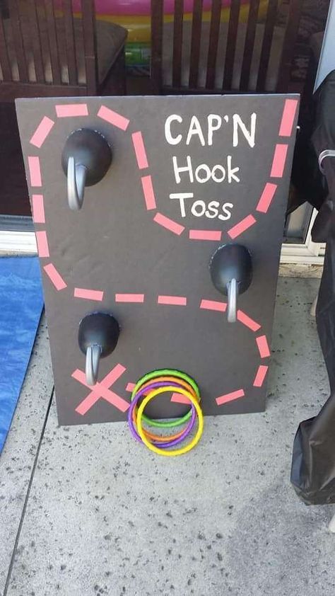 Pirate birthday party game! Re-pinned by PSST! Let's Talk- Follow for more ideas: https://www.pinterest.com/speechtherapytx/ Diy Pirate Party Ideas, Captain Hook Ring Toss Game, Pirate Pool Party Ideas, Diy Pirate Birthday Party, Pirate Ring Toss, Captain Hook Ring Toss, Off Two Neverland Party, Pirate Mickey Birthday Party, Peter Pan Theme Party