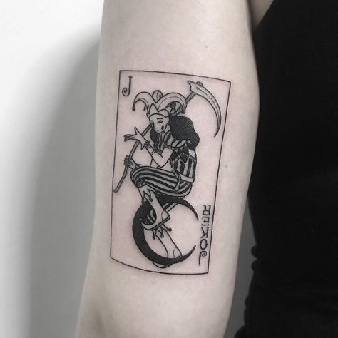 Joker card tattoo by Nudy tattooer inked on the left triceps Joker Card Tattoos For Men, Tato Joker, Joker Card Tattoo, Jester Tattoo, Joker Tattoos, Playing Card Tattoos, Small Wave Tattoo, Tato Tradisional, Joker Tattoo Design