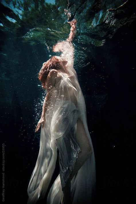 A woman swimming upward to the water surface. Dark Academia Aesthetic Fashion Women, Underwater Drawing, Underwater Portrait, Water Shoot, Underwater Painting, Water Aesthetic, Ocean Kids, Girl In Water, Underwater Art