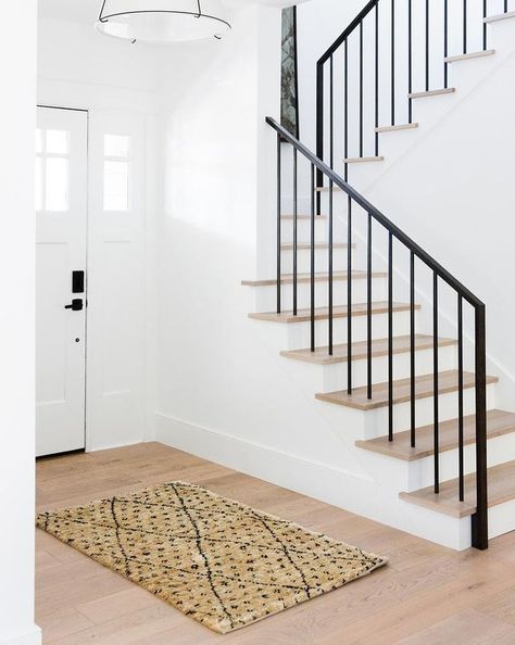 5 Rules For Using Black Accents In Your Home - Anita Yokota Banister Remodel, Black Stair Railing, Metal Stair Railing, Black Stairs, Hardwood Stairs, Diy Staircase, Iron Staircase, Stairs In Living Room, Iron Stair Railing