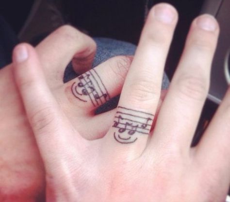 Music Couple Tattoos Music Lover Tattoo, Small Music Tattoos, Marriage Tattoos, Ring Tattoo Designs, Wedding Band Tattoo, Tattoo Band, Ring Tattoo, Tattoos Infinity, Tattoo Wedding Rings