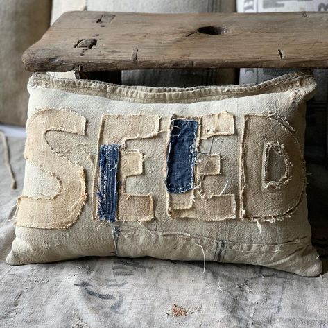 Christina (@thehalseyhomestead) • Instagram photos and videos Primitive Stitching, Vintage Booth Display, Antique Farmhouse Decor, Shabby Chic Quilts, Vintage Grain Sack, Grain Sack Pillows, Lace Pillow, Modern Packaging, Spring Pillows