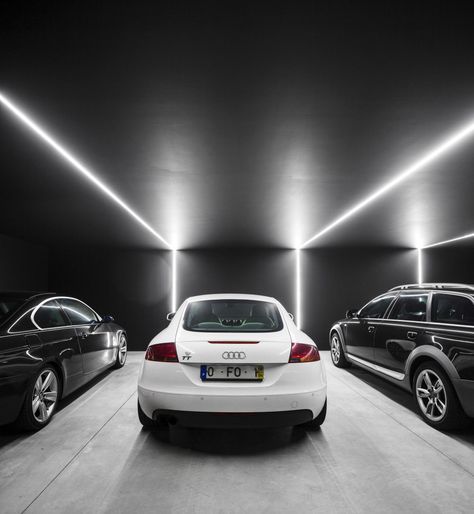 casa de sambade - penafiel portugal - spaceworkers - photo by fernando guerra fg… Parking Lighting, Car Park Design, Car Showroom Interior, Carport Modern, Car Showroom Design, Garage Design Interior, Underground Garage, Luxury Garage, Modern Garage