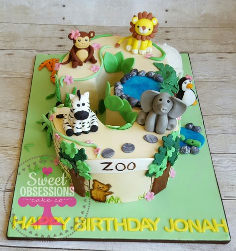 Number 3 shaped cake zoo theme Number 3 Animal Cake, 3 Shaped Birthday Cake, 3 Shaped Cake, Zoo Birthday Cake, Number 3 Cakes, Zoo Theme Birthday, Jungle Theme Cake, Zoo Cake, Girls First Birthday Cake