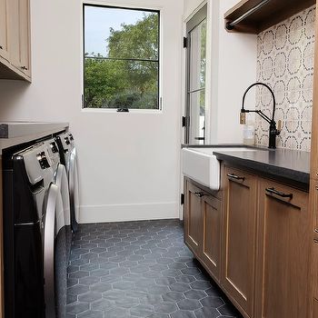 Black Laundry Room Cabinets with Gray Herringbone Floor Tiles - Transitional - Laundry Room Herringbone Floor Laundry Room, Tile Flooring Laundry Room, Black Floor Laundry Room, Dark Tile Laundry Room Floor, Black Hexagon Tile Laundry Room, Black Tile Laundry Room, Hexagon Tile Laundry Room, Black Laundry Room Cabinets, Gray Herringbone Tile Floor