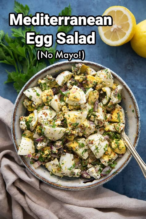 Enjoy this healthy egg salad with a Mediterranean twist that's ready in 20 minutes. This no mayo version gets its bright flavors from herbs, olives and zesty feta. This recipe is as easy as chop and mix! You can even cook the eggs a couple of days in advance and make the salad when you're ready. Egg Salad With Cucumber, Greek Egg Salad, Mediterranean Egg Salad Recipe, Salads With Egg, Pesto Egg Salad, Salads With Boiled Eggs, Boiled Egg Salad Healthy, What Goes With Egg Salad, Healthy Egg Salad With Greek Yogurt