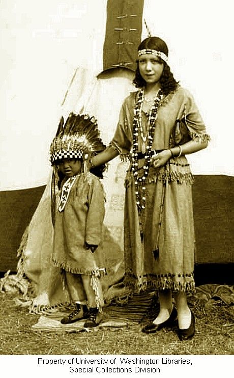 Native American woman and small child in traditional regalia standing in front of a teepee, probably Washington State, ca. 1929-1932. Native American Proverb, Native American Woman, Native American Children, American Indian History, Native American Pictures, Indigenous Americans, Cowboys And Indians, Native American Heritage, American Indian Art