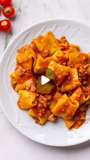 Maddie & Jules on Instagram: "This bolognese is our favorite thing to make on Sundays. It cooks low and slow for 4 hours resulting in the most comforting bolognese sauce full of warm flavors from the nutmeg, Parmesan, and beef.

Ingredients
2 tablespoons olive oil
6 tablespoons butter
1 1/4 cup chopped onion 225 g
1 1/4 cup chopped celery 225 g
1 1/4 cup chopped carrot 225 g
1 1/2 pound ground beef 80/20
3/4 pound ground spicy italian sausage (casing removed)
2 teaspoons salt divided
1/2 teaspoon Black pepper freshly ground
Pinch red pepper flakes
1 cup whole milk
Generous grating of nutmeg
1 cup dry white wine
1 ½ cups canned imported Italian plum tomatoes cut up, with their juice
1/4 cup tomato paste
Parmesan rind
Parmigiano-reggiano cheese and/or ricotta for topping
.
.
.
#pasta #bologn Sausage Bolognese Sauce, Meat Sauces, Spicy Italian Sausage, Sausage Casing, Parmesan Rind, Thing To Make, Bolognese Sauce, Chopped Carrots, Parmigiano Reggiano