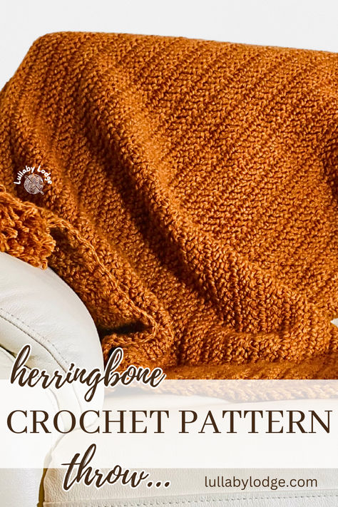 Herringbone crochet stitch throw in ginger brown on a white leather armchair Herringbone Single Crochet Blanket, Bulky Crochet Blanket Pattern Free, Crochet Herringbone Blanket, Herringbone Crochet Blanket, Crochet Throw Pattern Free, Herringbone Double Crochet, Bulky Yarn Patterns, Crochet Throw Pattern, Herringbone Throw