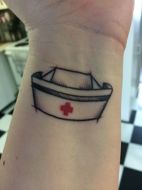 Nursing hat tattoo Er Nurse Tattoo Ideas, Nurse Cap Tattoo, Nursing Tattoo Ideas, Nurse Tattoo, Medical Tattoo, Ink Therapy, Magic Tattoo, Tattoos For Black Skin, Symbol Tattoos