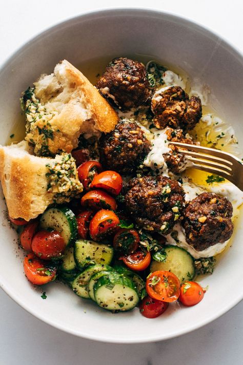 Sheet Pan Meatballs with Tomato Salad and Green Sauce! Juicy little sheet pan meatballs that are salty, zesty, briney, and so so delicious. Served with tzatziki, green sauce, and a tomato salad. #meatballs #beef #tomatosalad Sheet Pan Meatballs, Party Dinner Ideas, Meatballs Beef, Mediterranean Meatballs, Pinch Of Yum, Recipes Healthy Dinner, Recipes Easy Dinner, Dinner Recipes Easy, Green Sauce